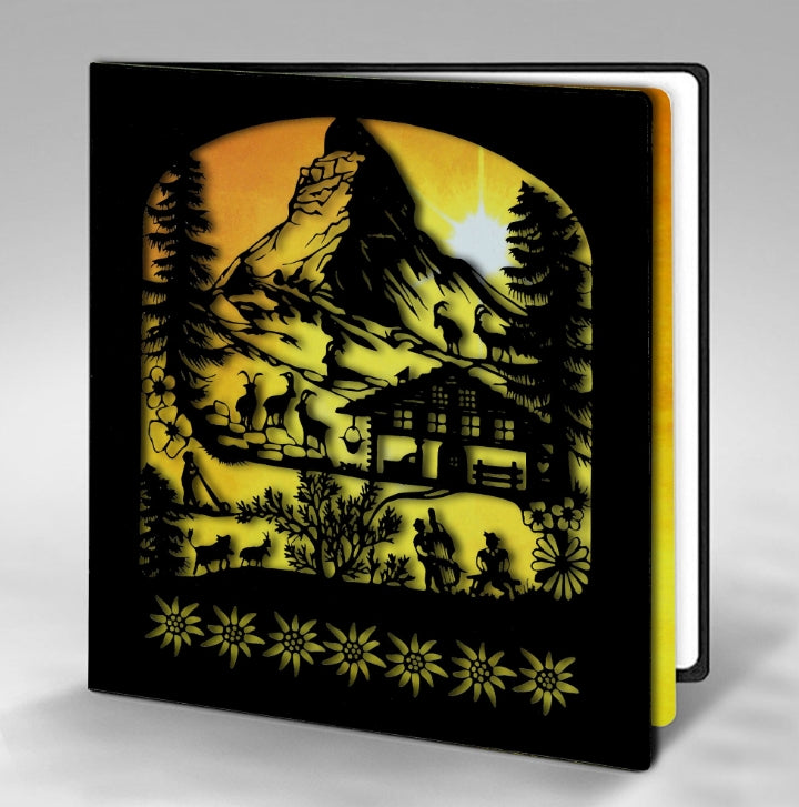 Black and orange Matterhorn paper cut card